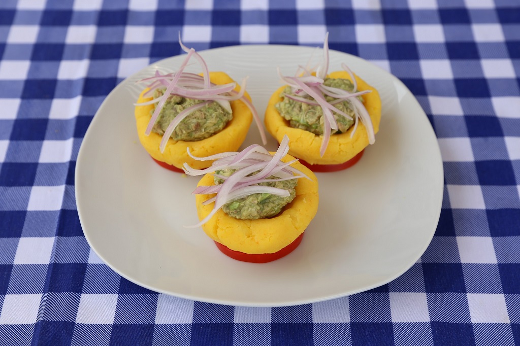Pescado nido de causa